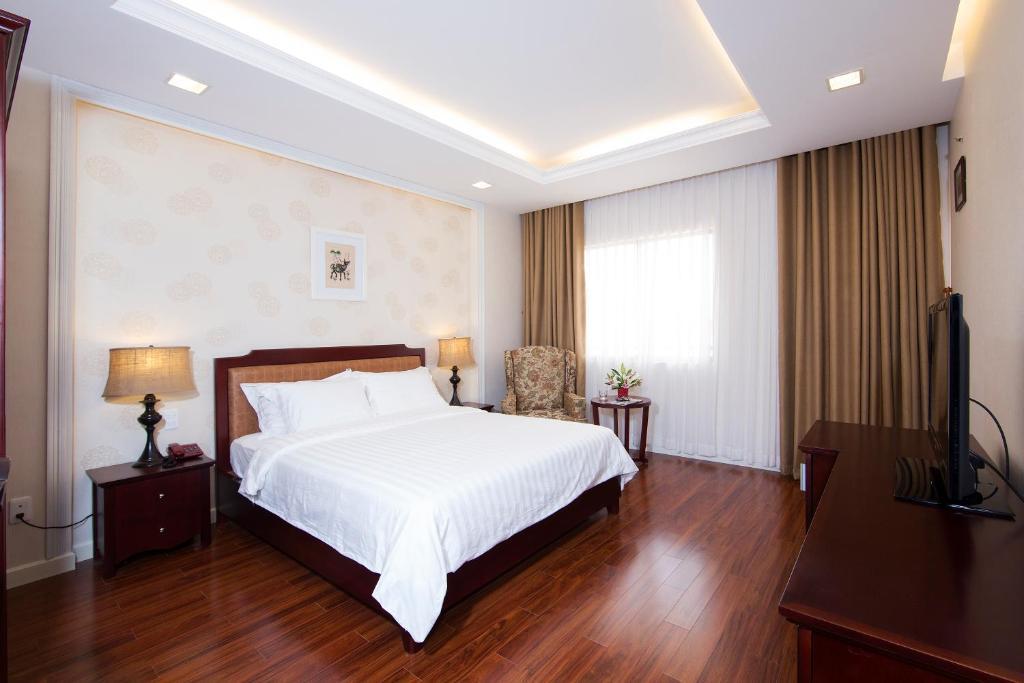 Royal Dragon Boutique Hotel Tan Binh Ho Si Minh-város Szoba fotó